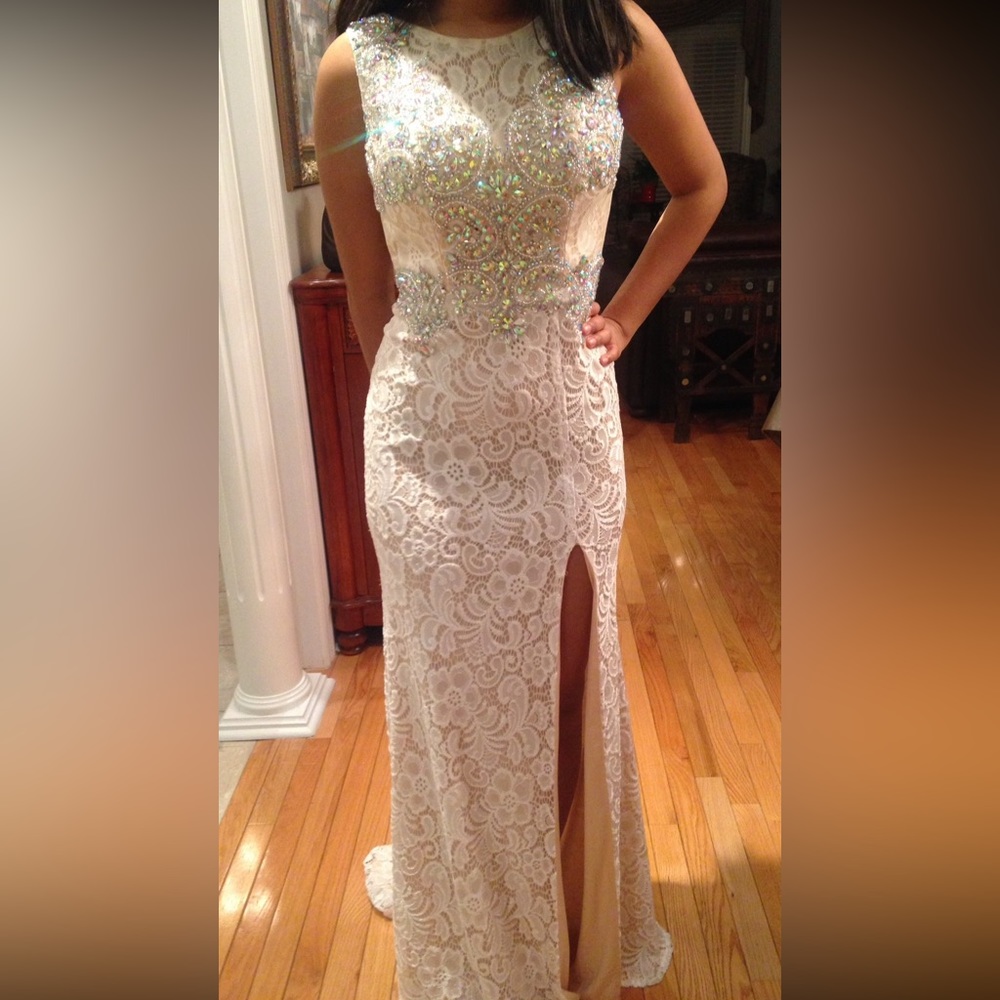 Nude lace embellished prom gown with side slit